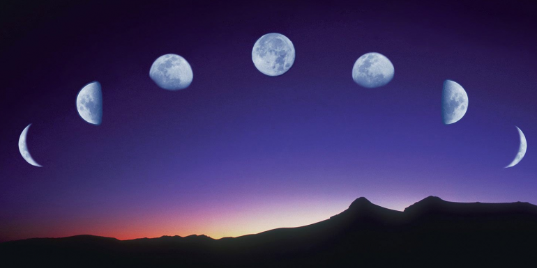 Phases of the moon over a mountain range